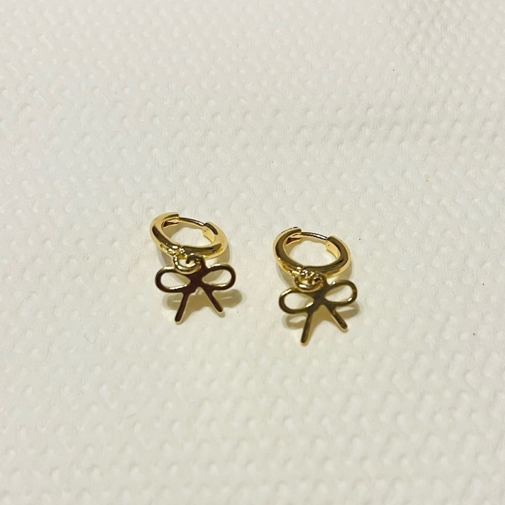 Gold Huggie bow knot earrings